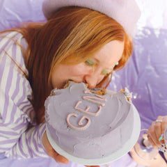 woman eating a cake